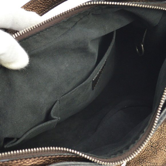 LOUIS VUITTON XS MORDRE MONOGRAM MAHINA - Picture 9 of 15